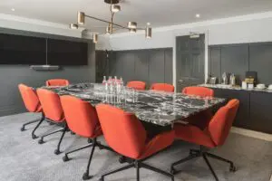 The Chamberlain meeting room with refreshments and 2 tvs